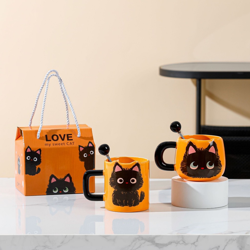 รูปสินค้า เซตแก้วกาแฟ ของขวัญลายแมวส้มสวยน่ารัก ชาวออฟฟิศต้องมี ของชำร่วย